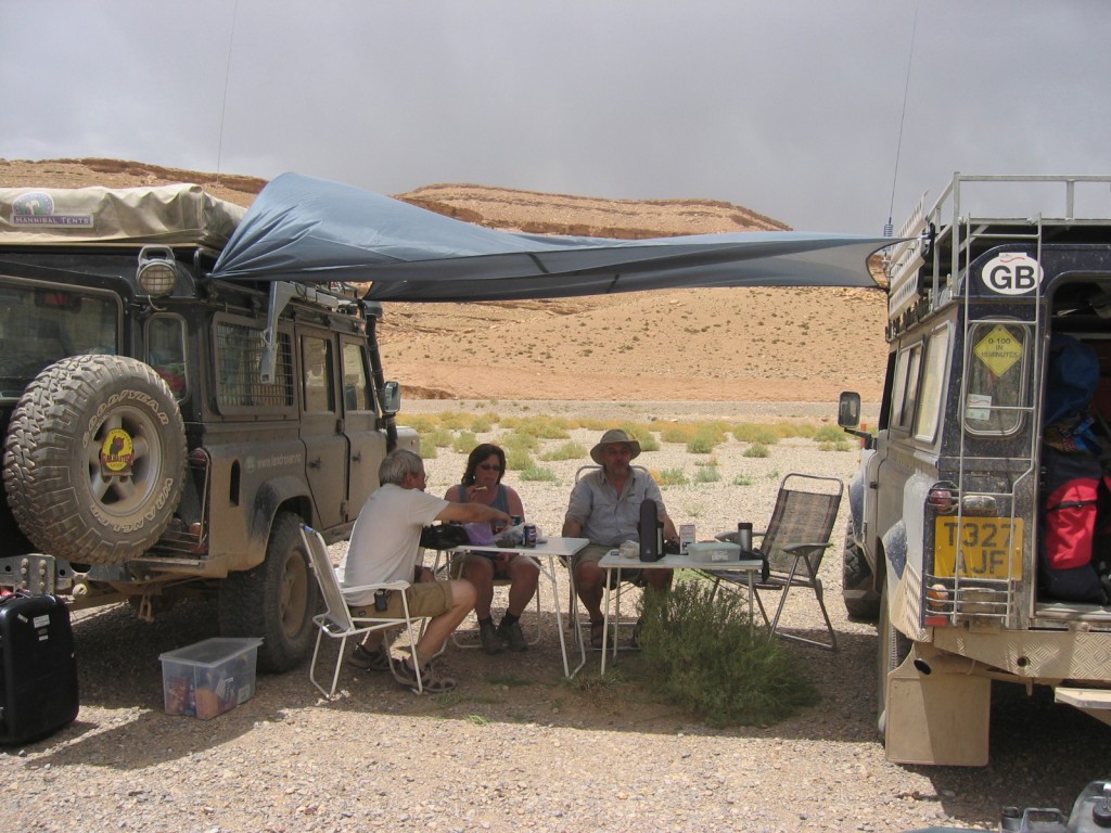 Atle, Hilde and Tim taking shade